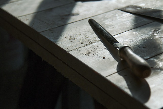 modern stonecraft workshop tools chisels and stone samples on clean table